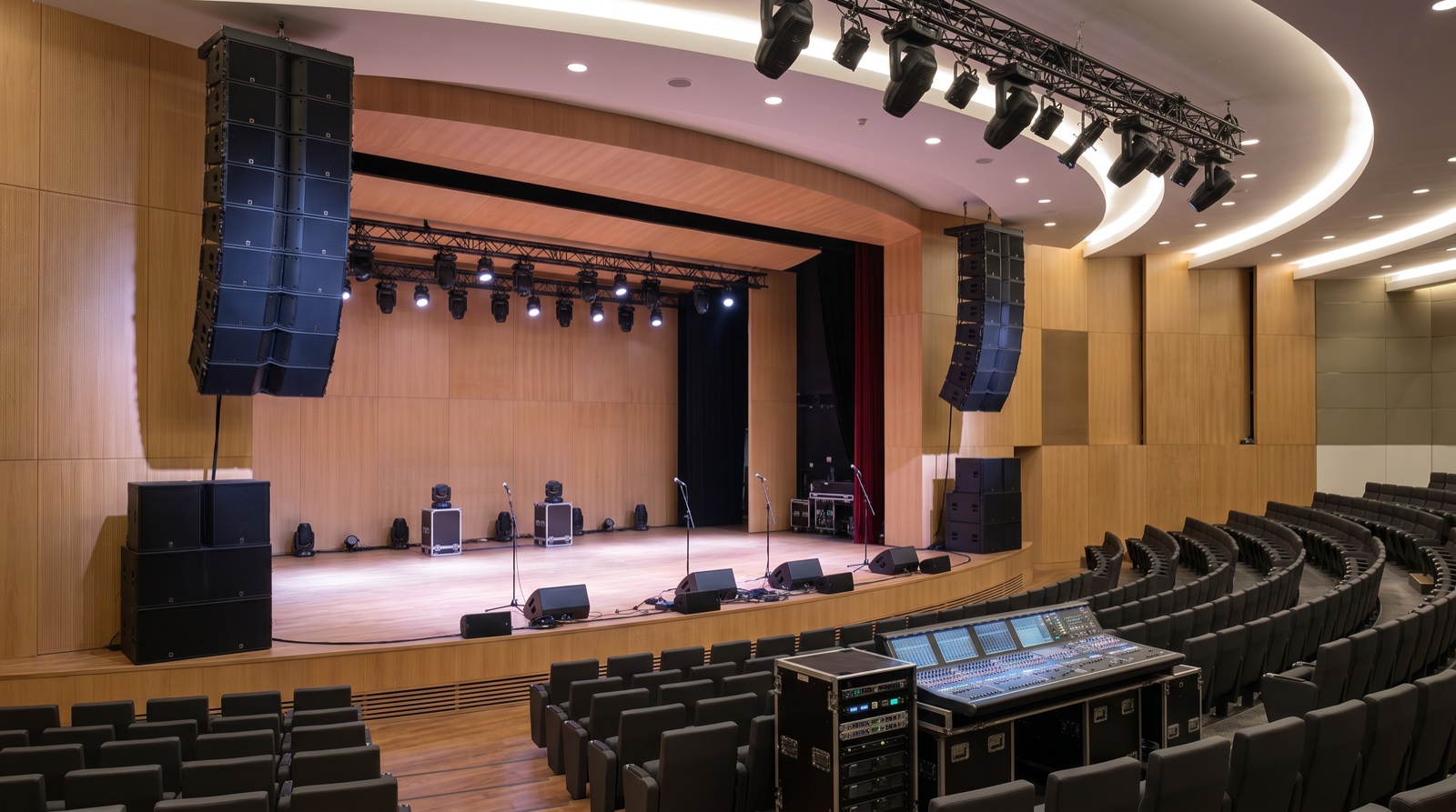 Auditorium integrated AV install, line-array PA and stage lighting